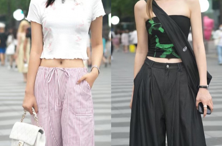 走在杭州街头，发现“小背心+高腰裤”还是很流行，而且时髦又显腿长